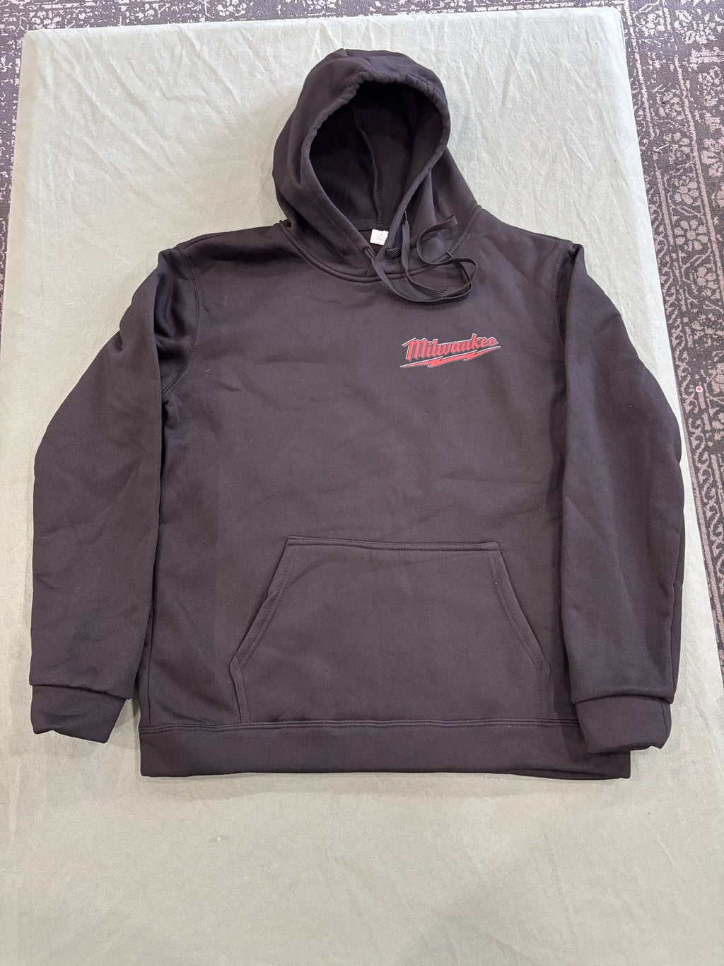 Milwaukee Black Hoodie with Red Logo and Skull Design