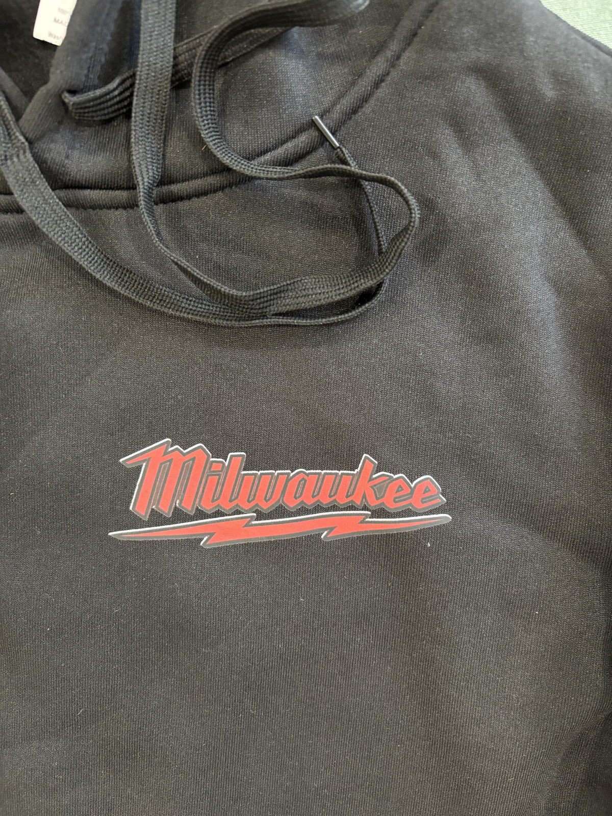 Milwaukee Black Hoodie with Red Logo and Skull Design