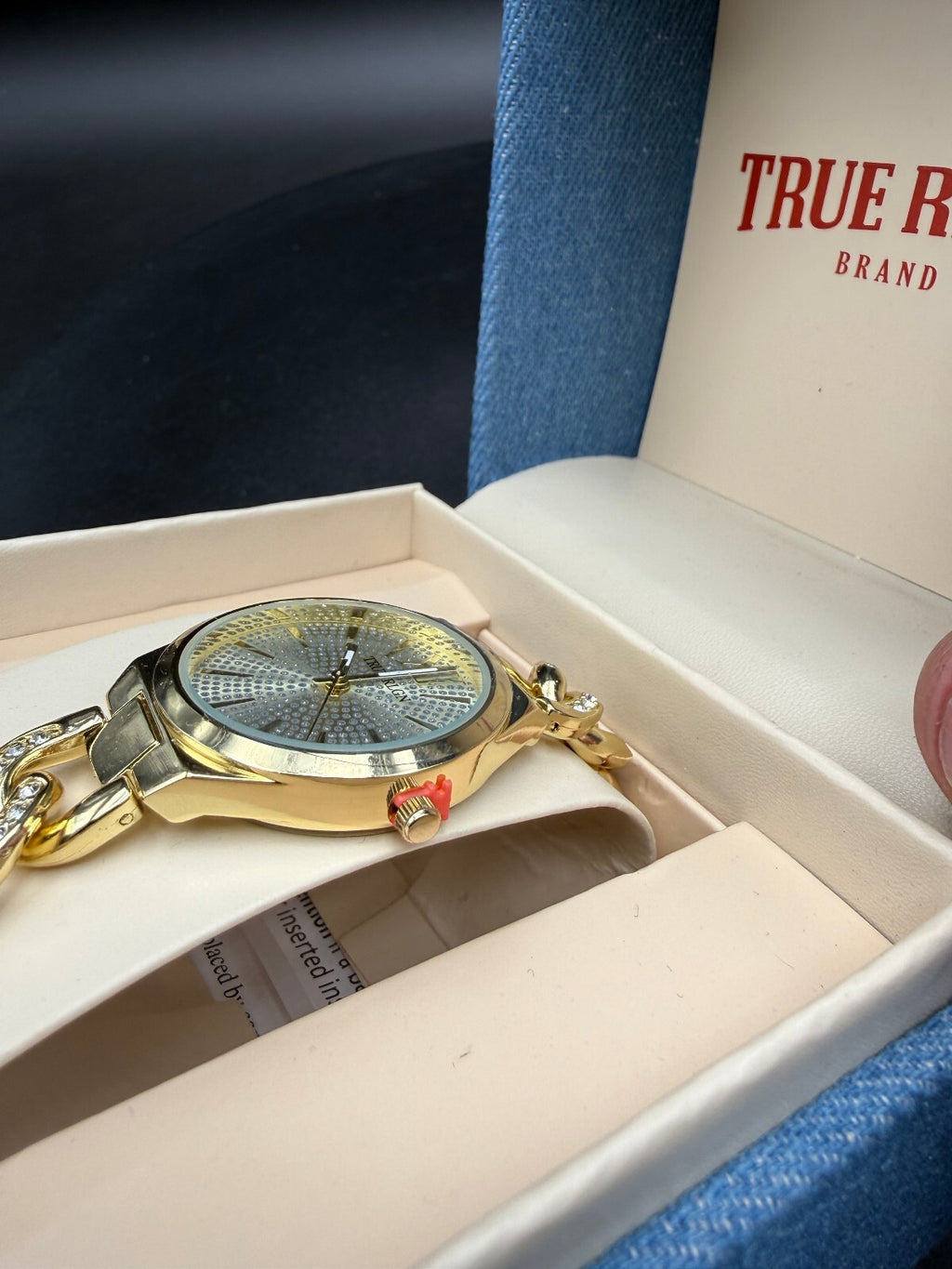 True Religion gold-tone chain bracelet watch